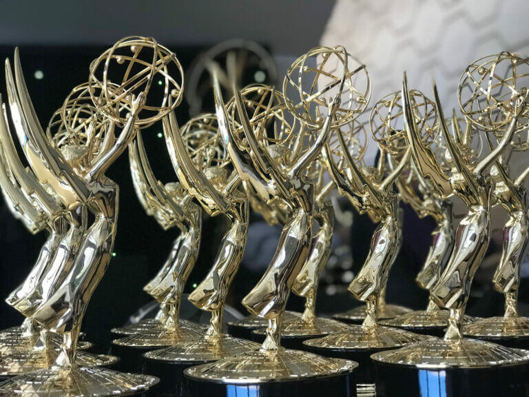 Emmy Awards trophies going to various casting directors.