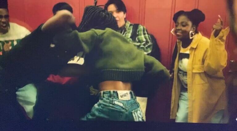 Umia-Jones Watson and actors in a school.