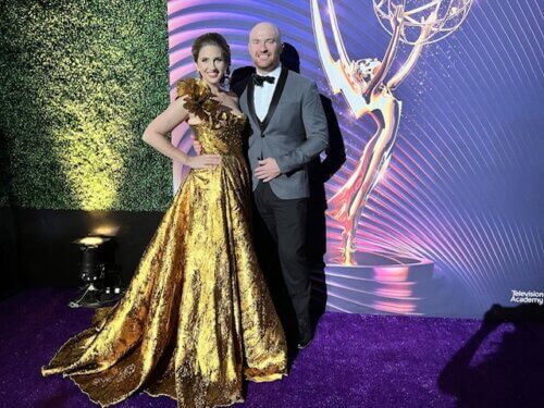 Chase Paris with his wife at the Emmy Awards red carpet event.