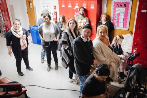 Michelle Danner on set directing a movie set in hight school.