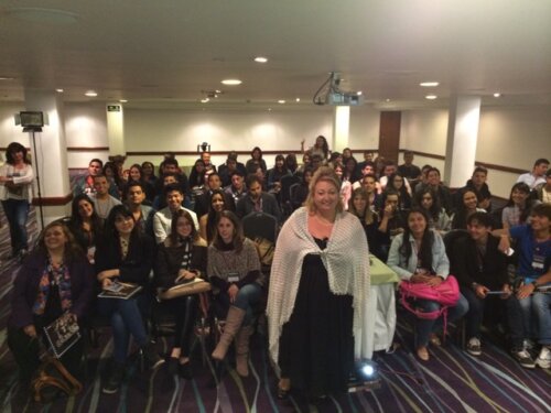 Michelle Danner with a conference room of students in Guatemala.