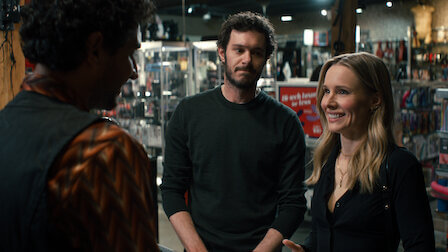 Adam Brody and Kristen Bell talking to someone in a store in Netflix's 'Nobody Wants This.'