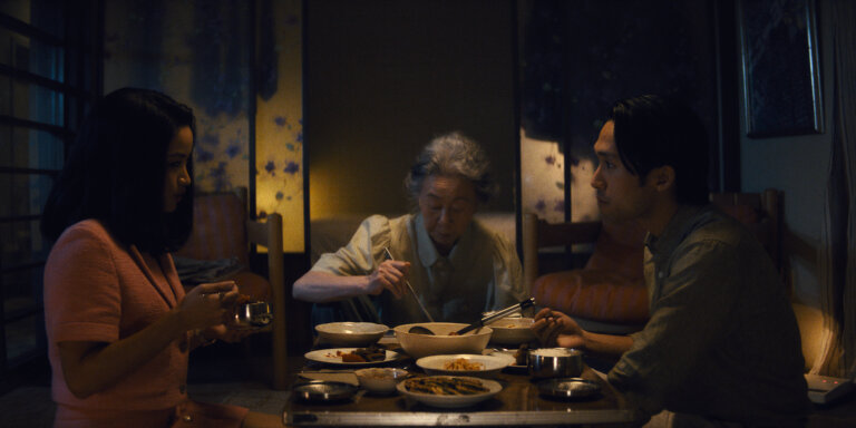 Anna Sawai, Yuh-Jung Youn and Jin Ha eating dinner in "Pachinko,"