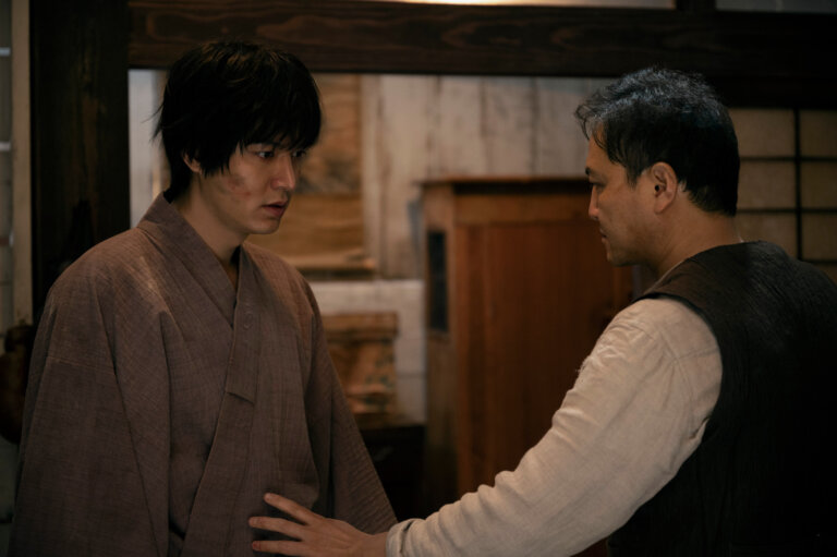 Lee Minho and Woong In Jung in “Pachinko,” wearing 19th century Japanese clothing.