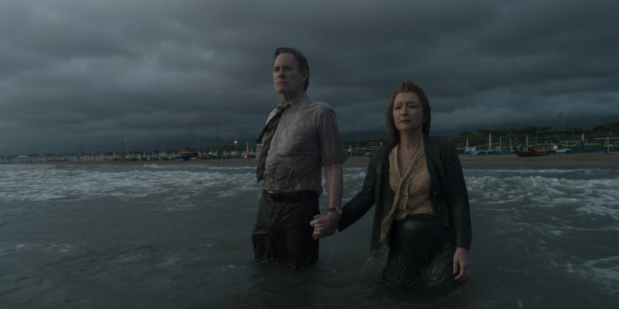 Kevin Kline as Stephen Brigstocke (2001) and Lesley Manville as Nancy Brigstocke wading in the water in 'Disclaimer.'