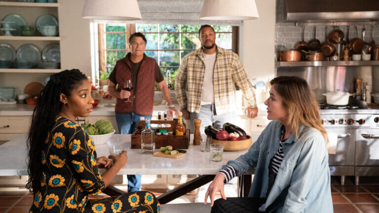Jessica Williams, Ted McGinley, Luke Tennie and Christa Miller sitting at a table inside.