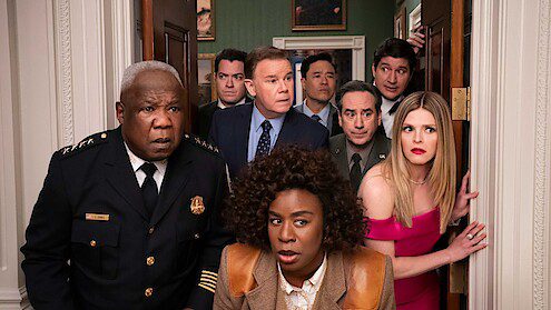 Uzo Adouba and a host of characters in various dinner party clothes looking concerned in Netflix's The Residence.